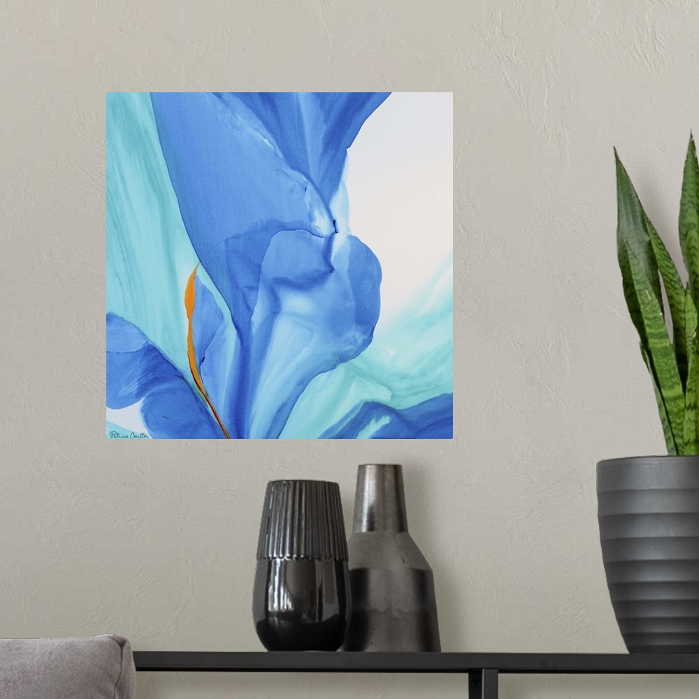 A modern room featuring Contemporary abstract painting using tones of blue to make sinuous and smooth strokes of colors.