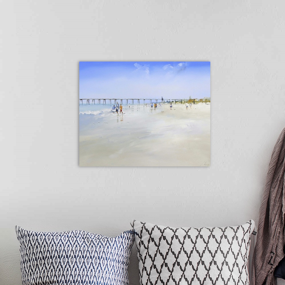 A bohemian room featuring Painting of people walking on a sandy beach with a pier in the distance.