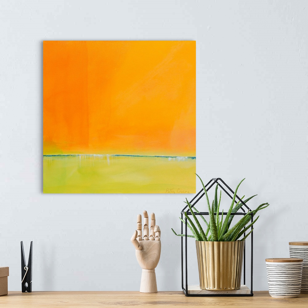 A bohemian room featuring Contemporary abstract painting in bright orange and yellow-green.