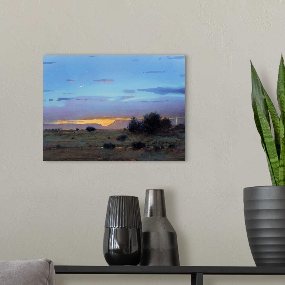 A modern room featuring A contemporary painting of a southwestern landscape under a blue stormy sky.
