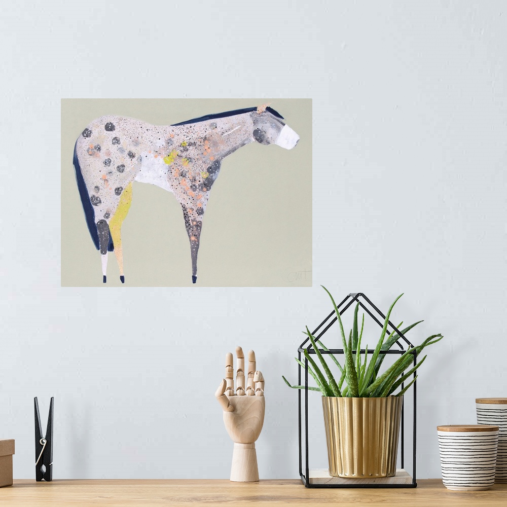 A bohemian room featuring A contemporary painting of a multi-colored horse against a neutral background.