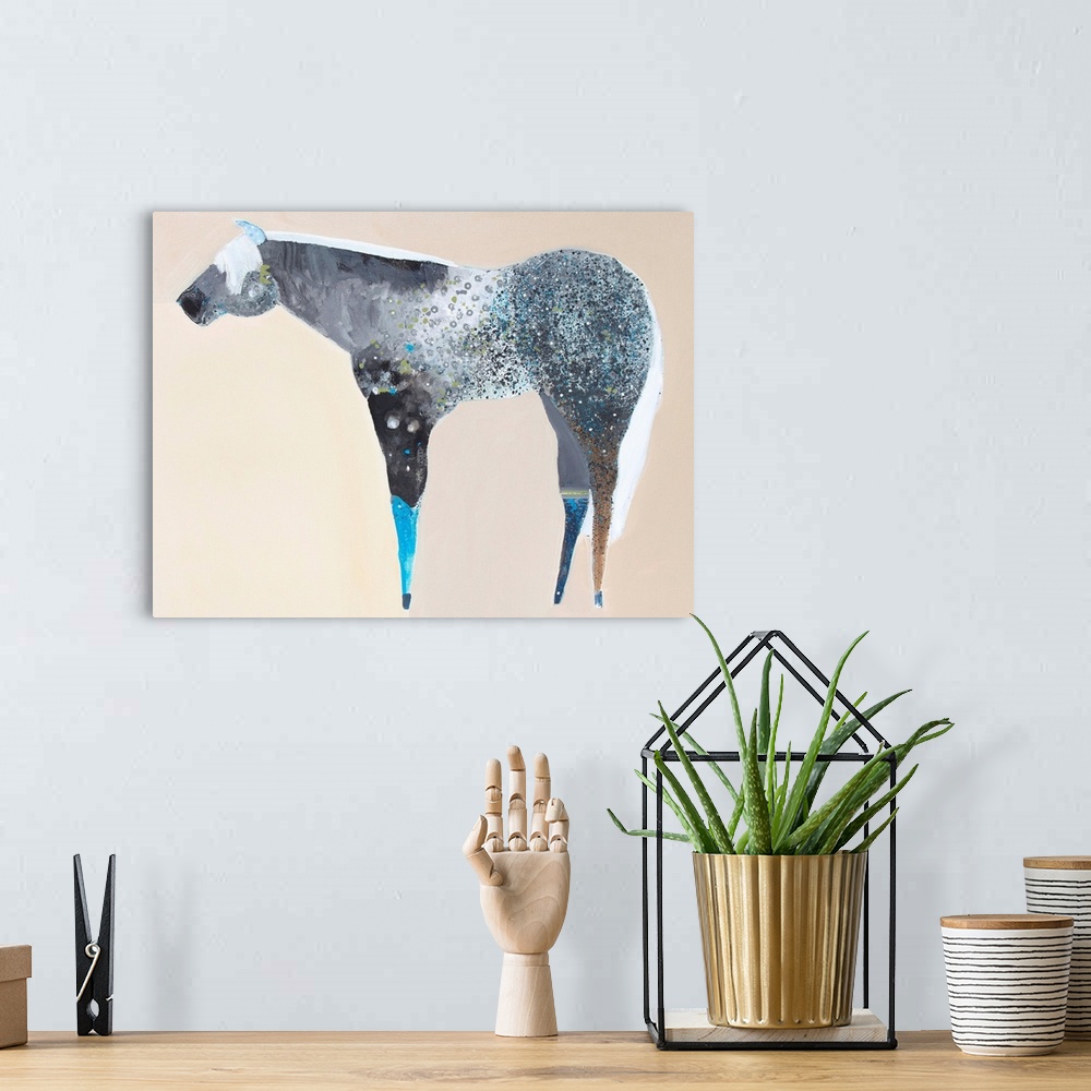 A bohemian room featuring A contemporary painting of a multi-colored horse against a neutral background.