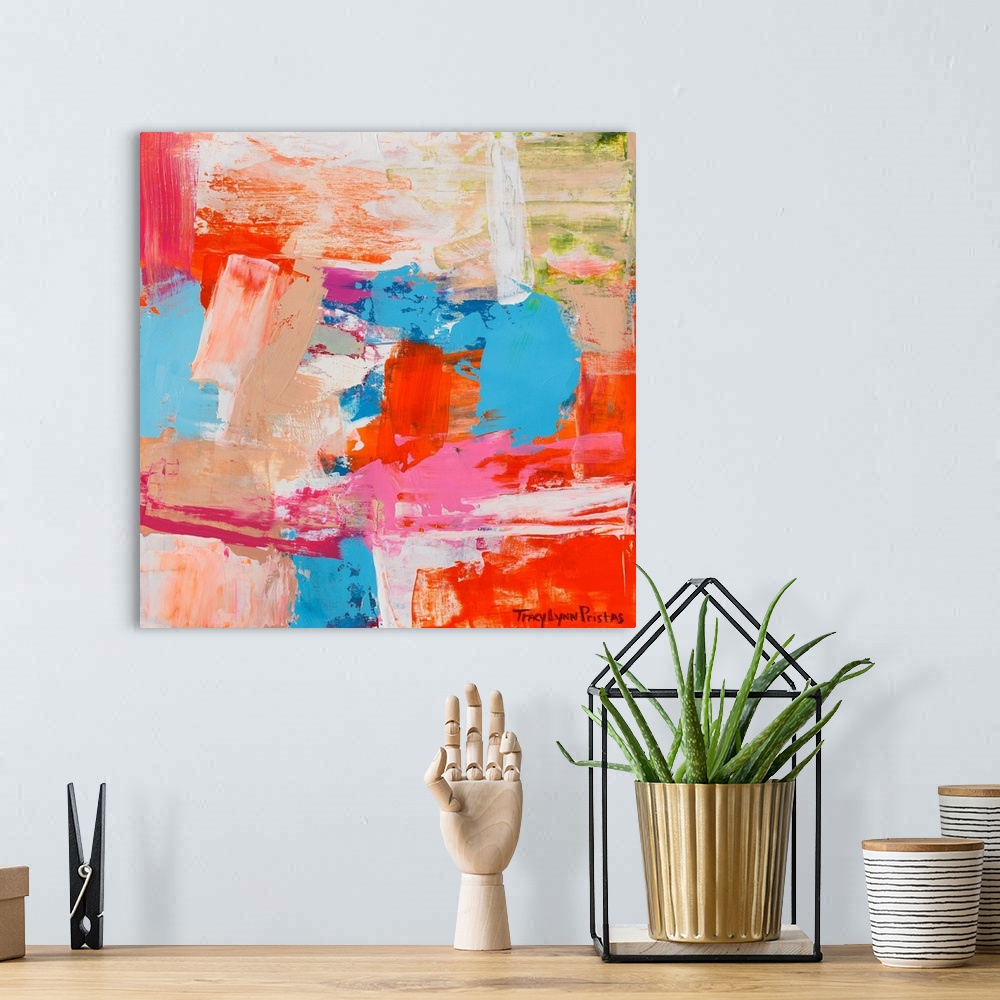 A bohemian room featuring A square abstract painting of textured bright colors.