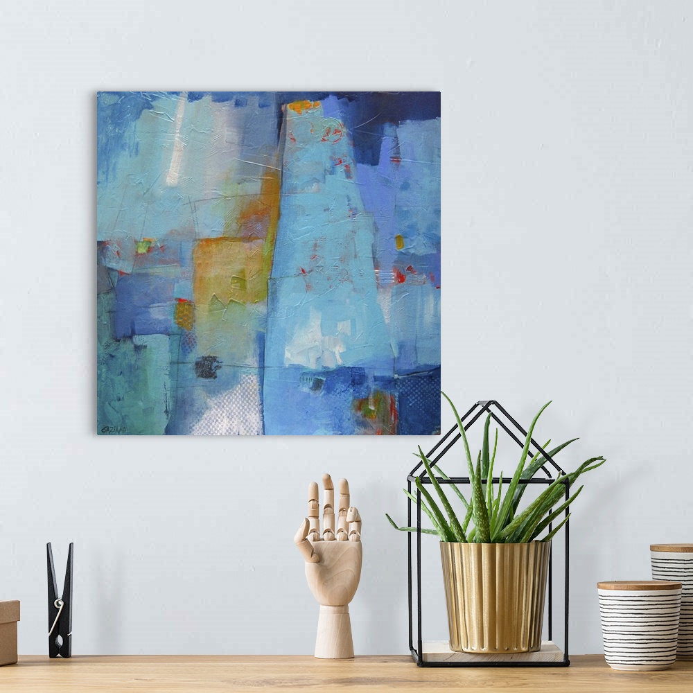 A bohemian room featuring Contemporary abstract painting using dominant cool tones mixed with warm earthy tones.