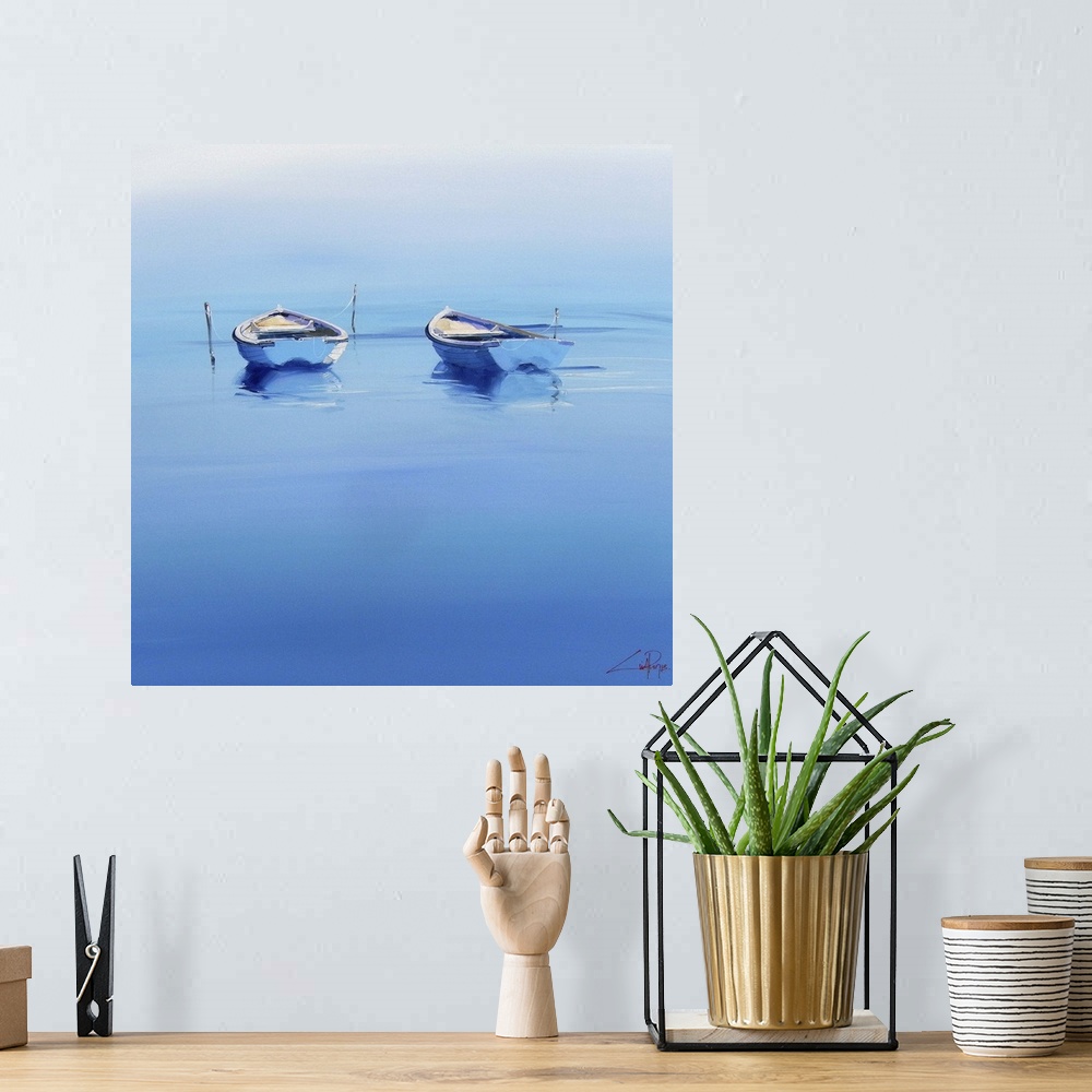 A bohemian room featuring Contemporary painting of two boats floating on the calm ocean.