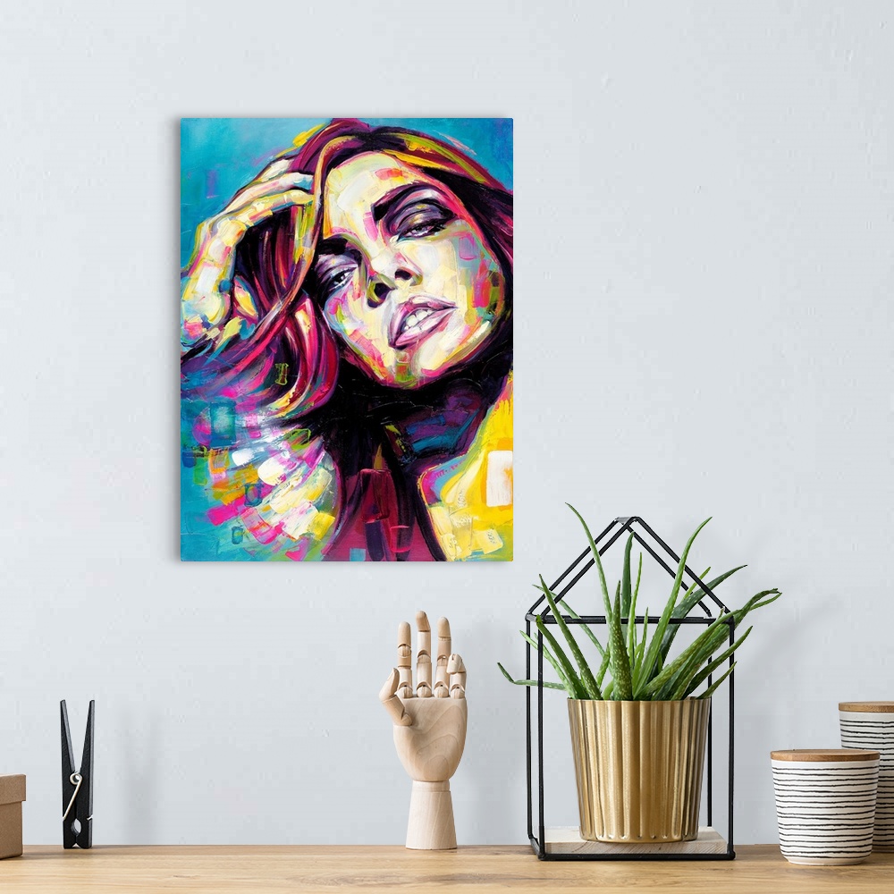 A bohemian room featuring Vertical abstract portrait of a woman in vibrant colors.