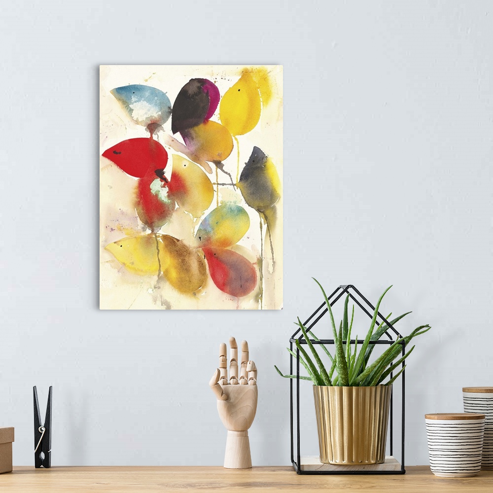 A bohemian room featuring Contemporary abstract watercolor painting of vibrant colored autumn leaves.