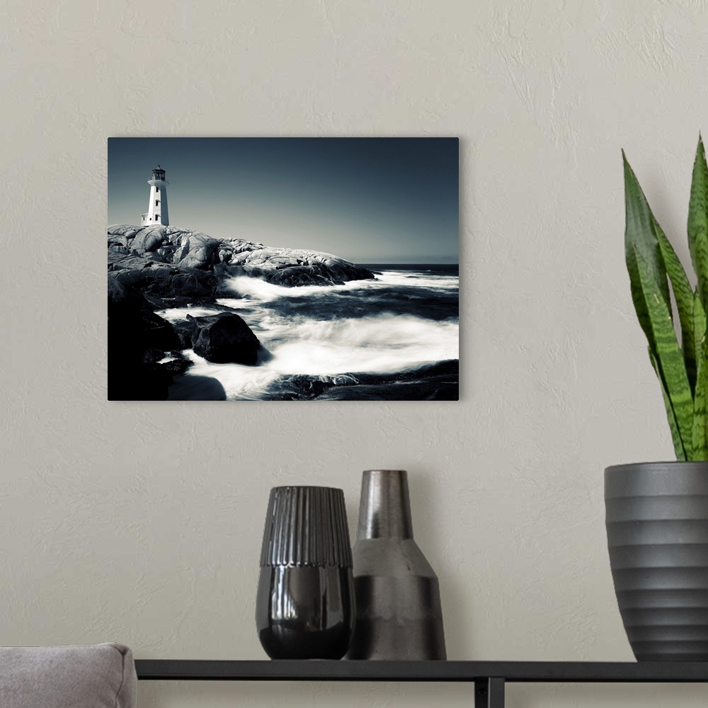 A modern room featuring A black and white image of Peggy's Cove Lighthouse in Nova Scotia, Canada.