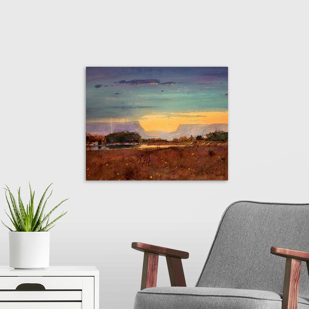A modern room featuring A contemporary painting of a southwestern landscape under a stormy sky.