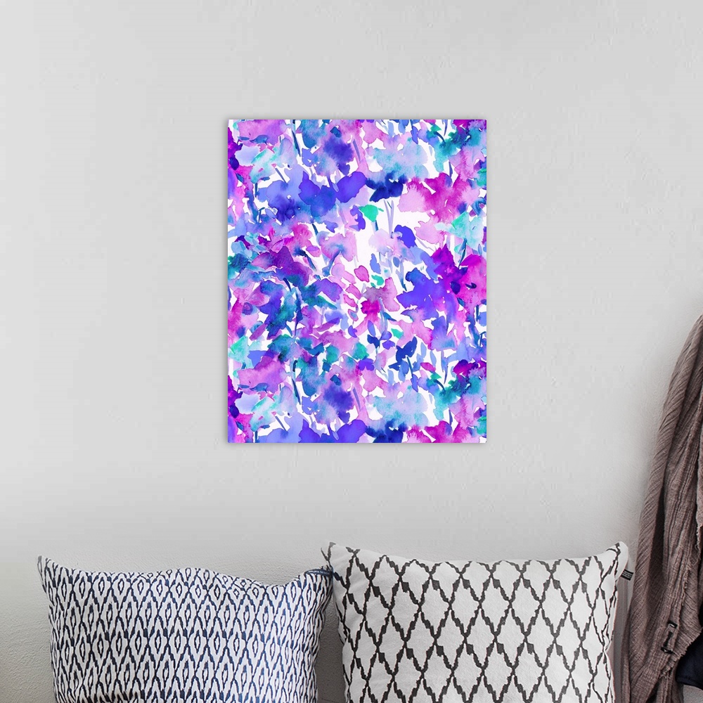 A bohemian room featuring An abstract watercolor painting of branches of leaves in colors of blue and purple.