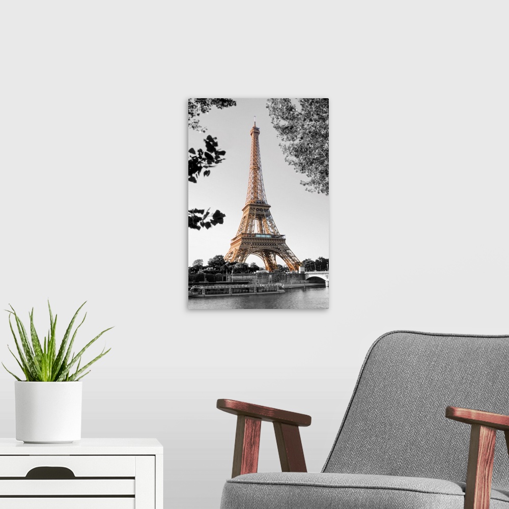A modern room featuring Photograph of the Eiffel Tower with the background in black and white.