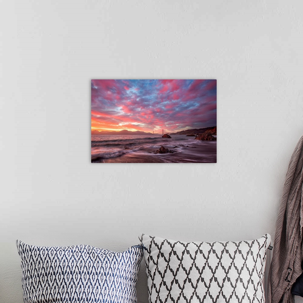 A bohemian room featuring Photograph of the San Franciso bay at sunrise with pink and blue clouds overhead.