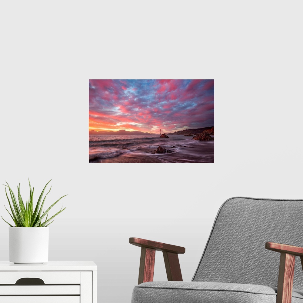 A modern room featuring Photograph of the San Franciso bay at sunrise with pink and blue clouds overhead.
