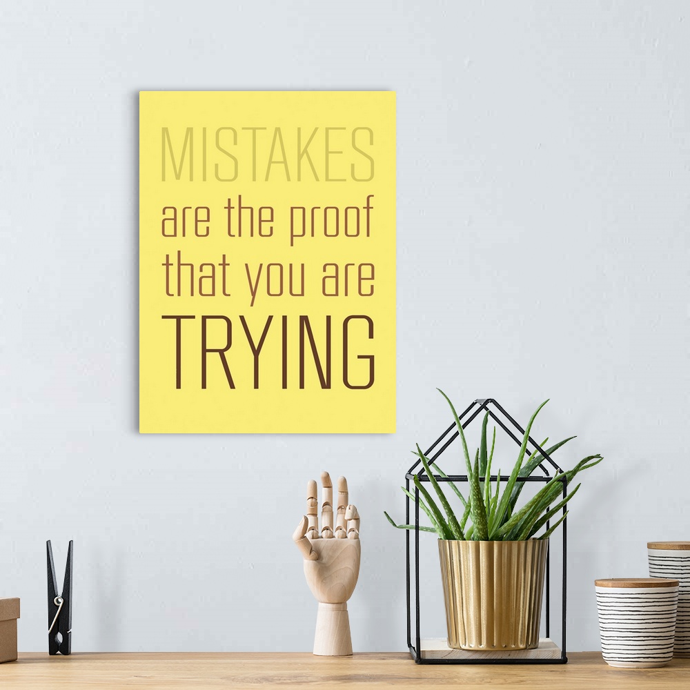 A bohemian room featuring "Mistakes Are The Proof That You Are Trying"