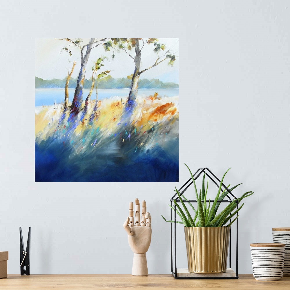A bohemian room featuring Contemporary painting of trees and grass growing next to a river.