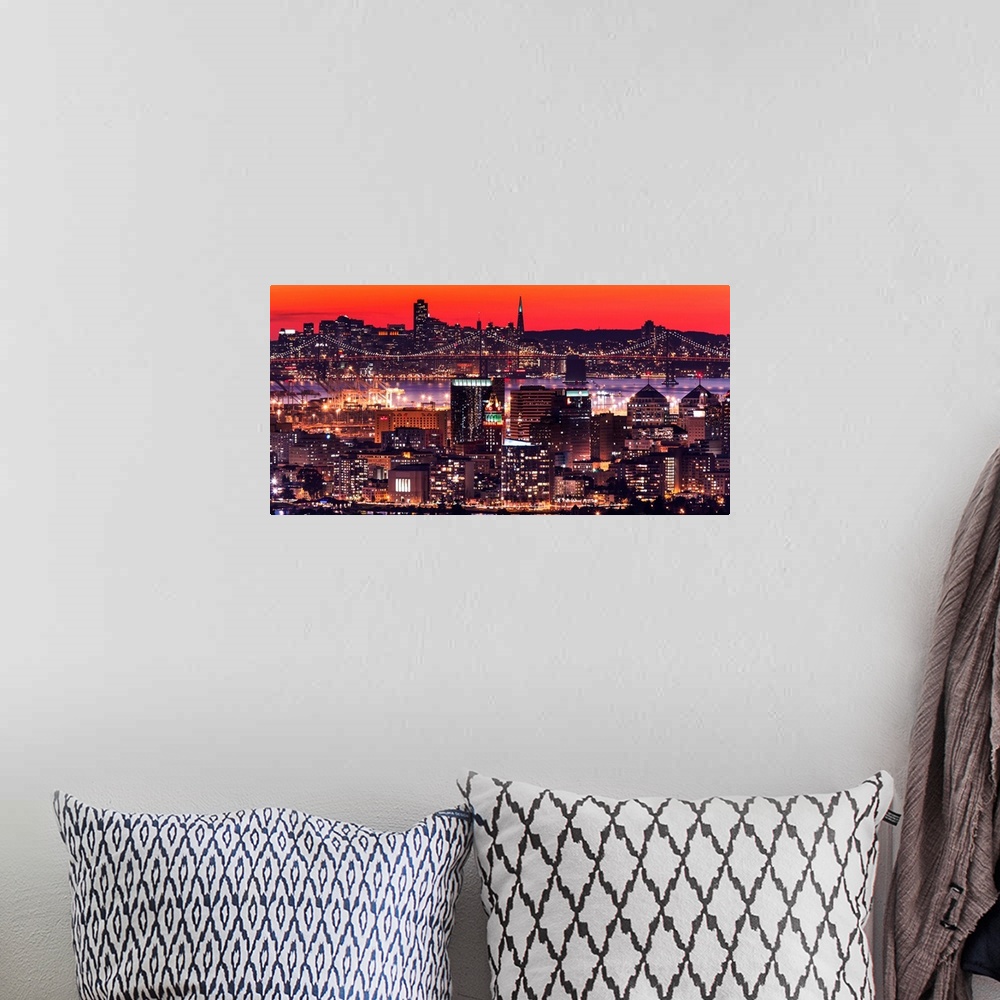 A bohemian room featuring A photograph of a vibrant neon lighted cityscape at sunset.