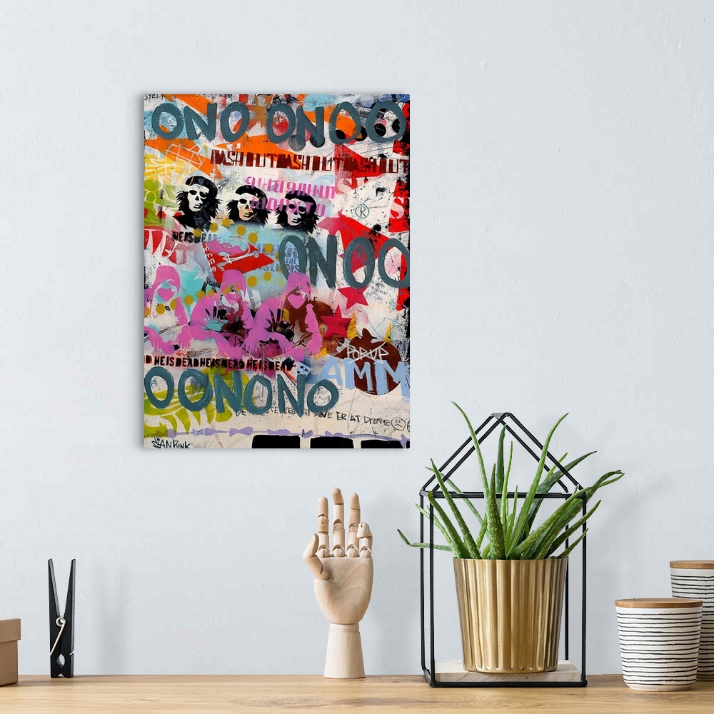 A bohemian room featuring Abstract vertical collage of text and varies painted shapes.