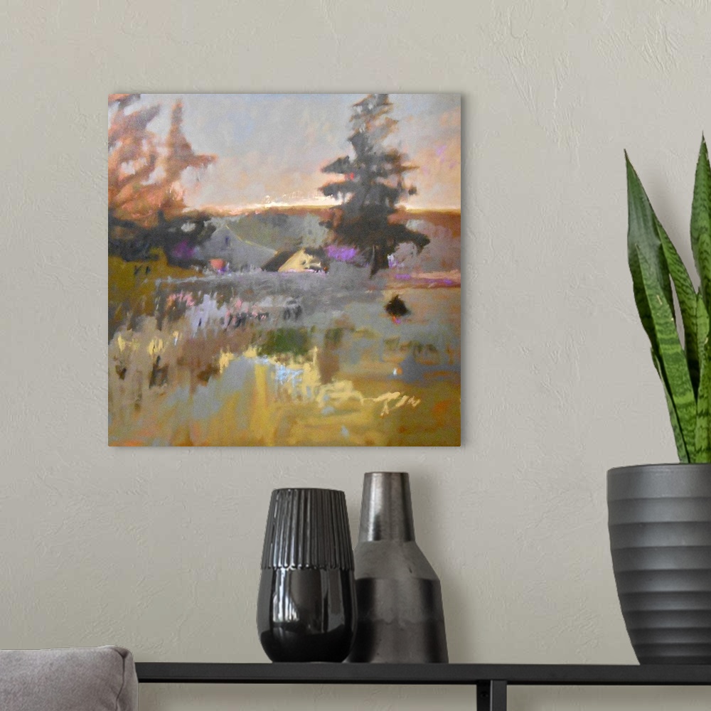 A modern room featuring Colorful contemporary landscape painting using muted tones.