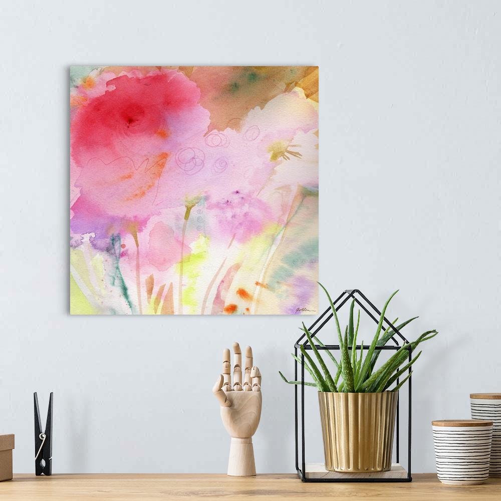 A bohemian room featuring A watercolor painting of pink flowers in pastel colors.