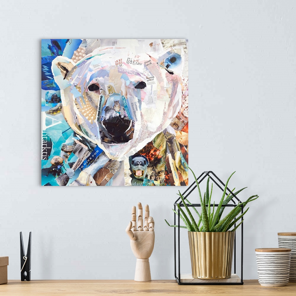 A bohemian room featuring Mixed media artwork of a polar bear made from cut magazine and book pages.