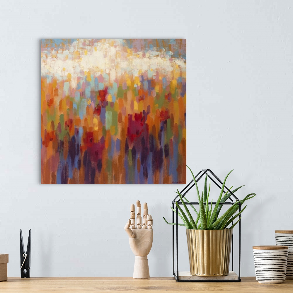 A bohemian room featuring A colorful contemporary painting of a field of flowers.