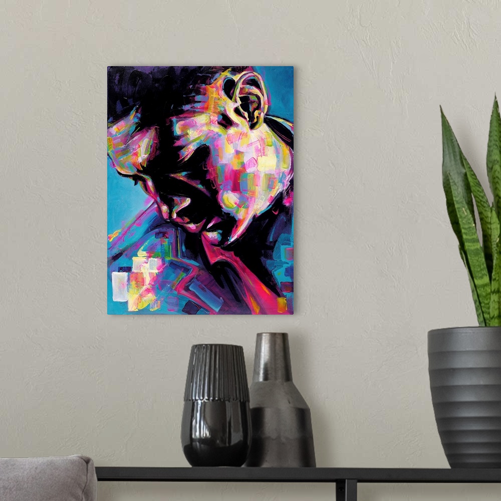 A modern room featuring Vertical abstract portrait of a man in vibrant colors.