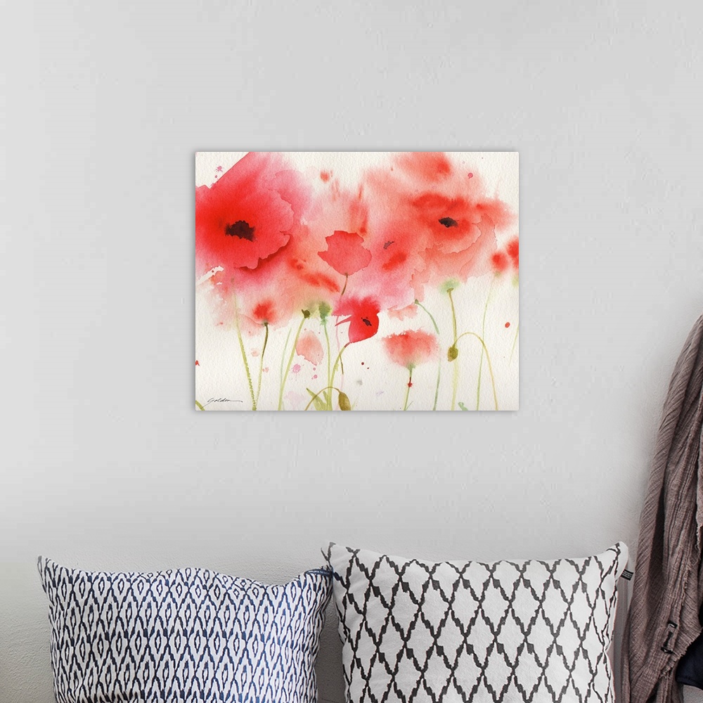 A bohemian room featuring A horizontal watercolor painting of red poppies.