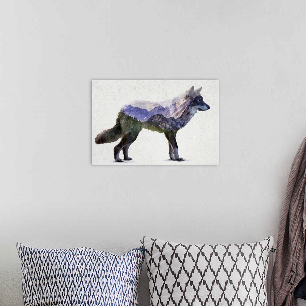 A bohemian room featuring A contemporary piece of artwork of a wilderness scene withing the outline of a wolf.