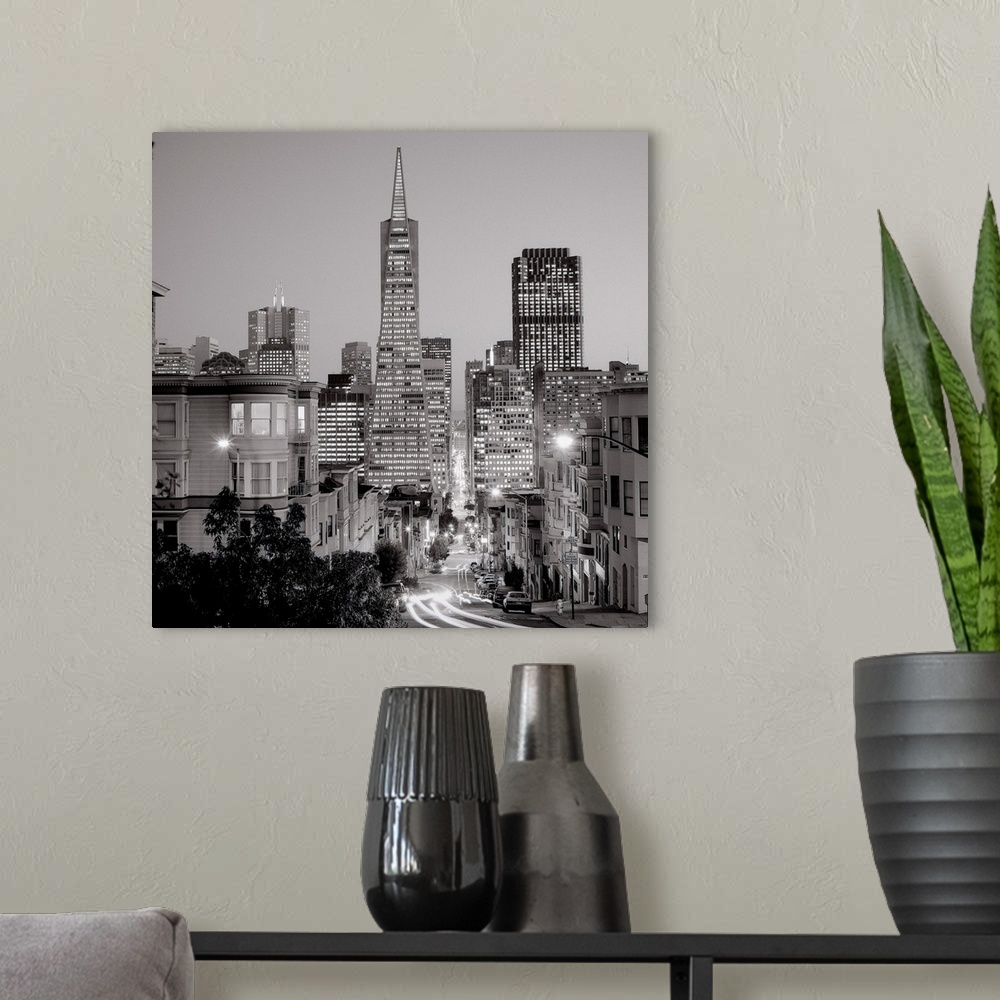 A modern room featuring A black and white photograph of the downtown area of San Francisco California.