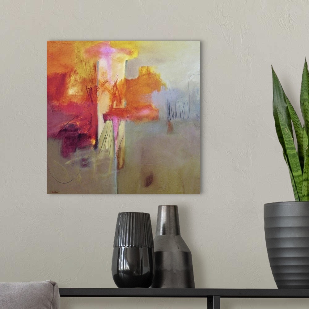 A modern room featuring Contemporary abstract painting using vibrant tones of red and deep golden orange tones.