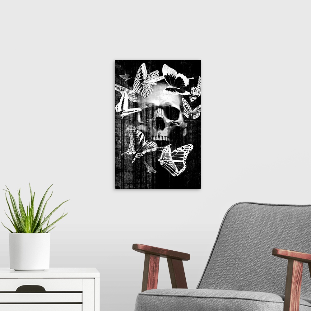 A modern room featuring Front view of a fake skull with open mouth isolated on black background.
