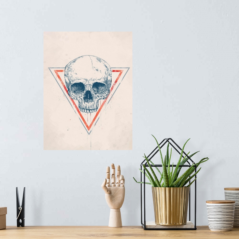 A bohemian room featuring Digital illustration of a skull within a triangle.