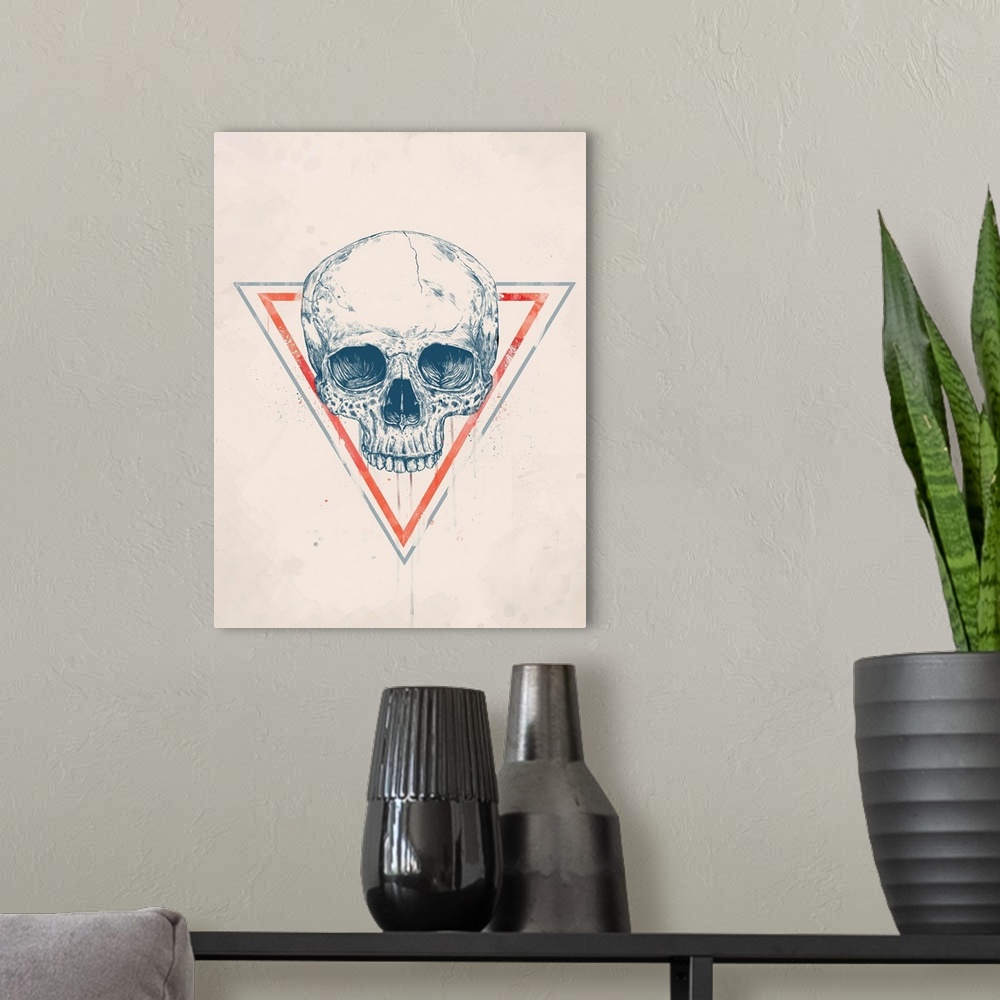 A modern room featuring Digital illustration of a skull within a triangle.