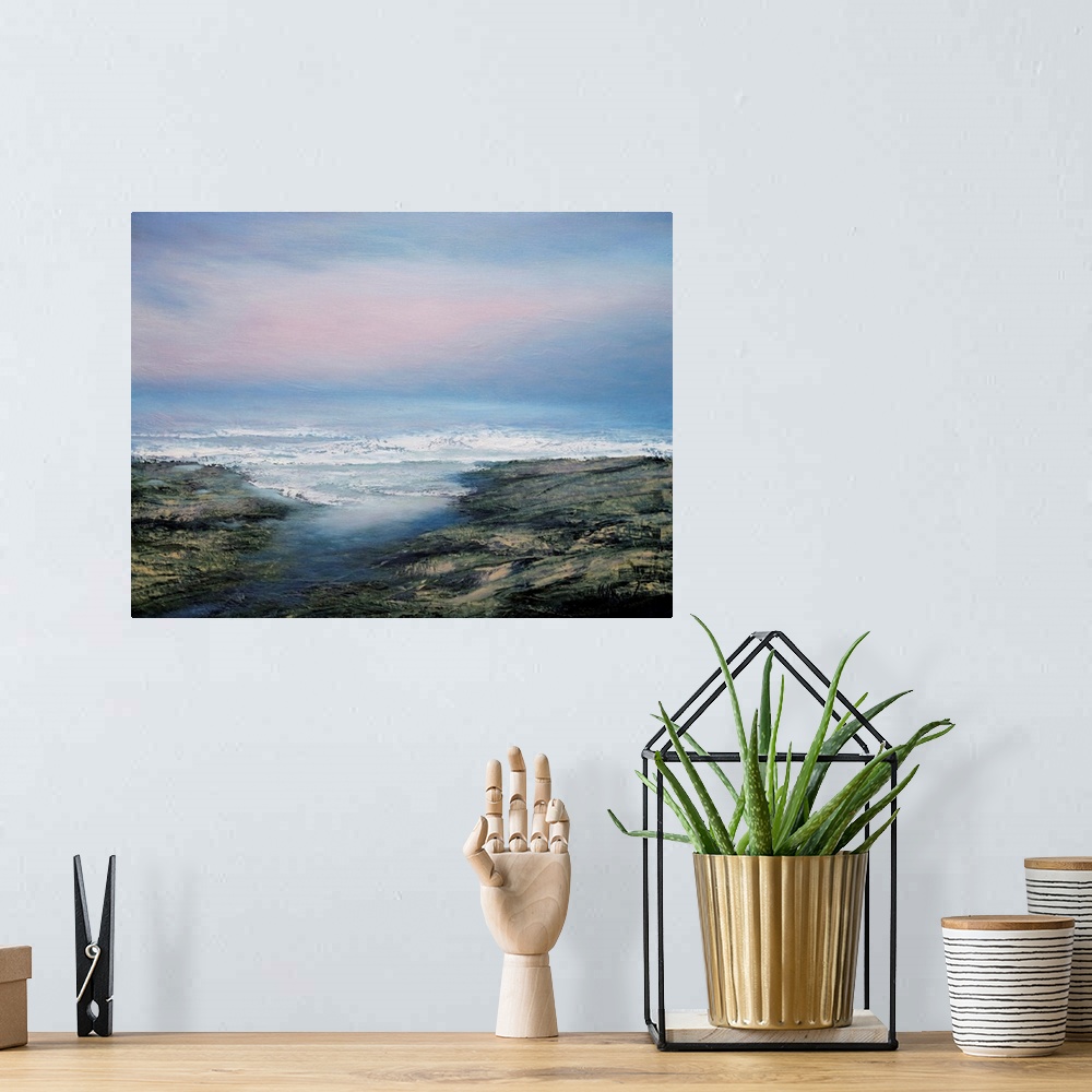 A bohemian room featuring Contemporary seascape painting in front of a pale pink and blue sky.