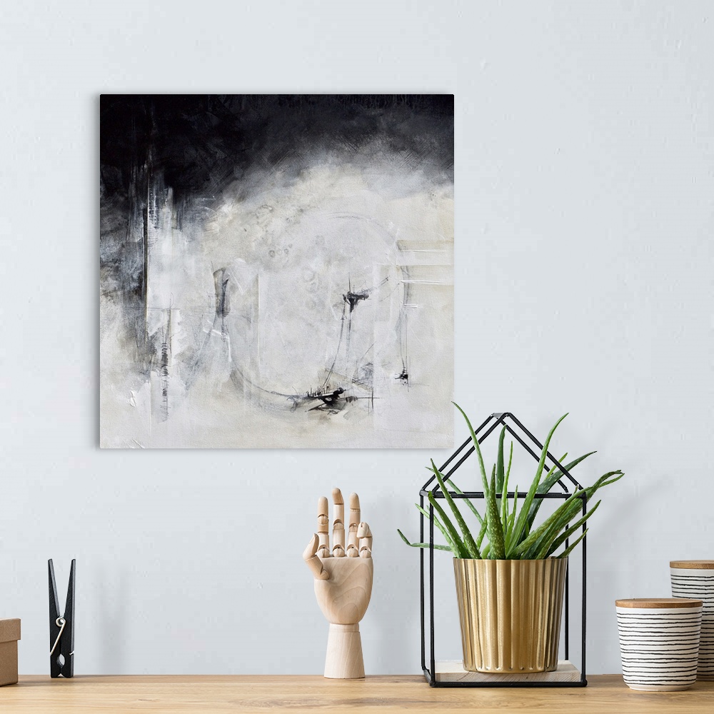 A bohemian room featuring Black and white abstract artwork with a hazy effect.