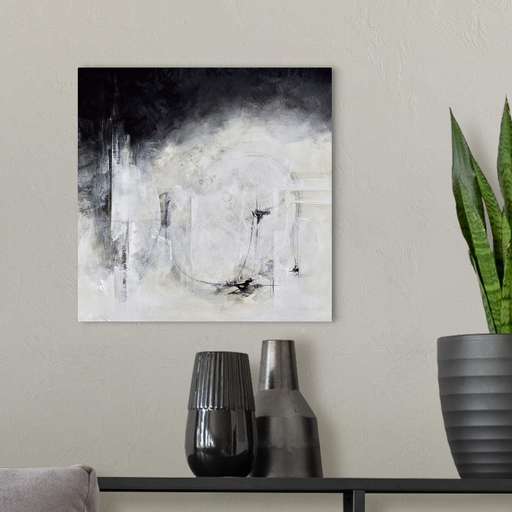 A modern room featuring Black and white abstract artwork with a hazy effect.