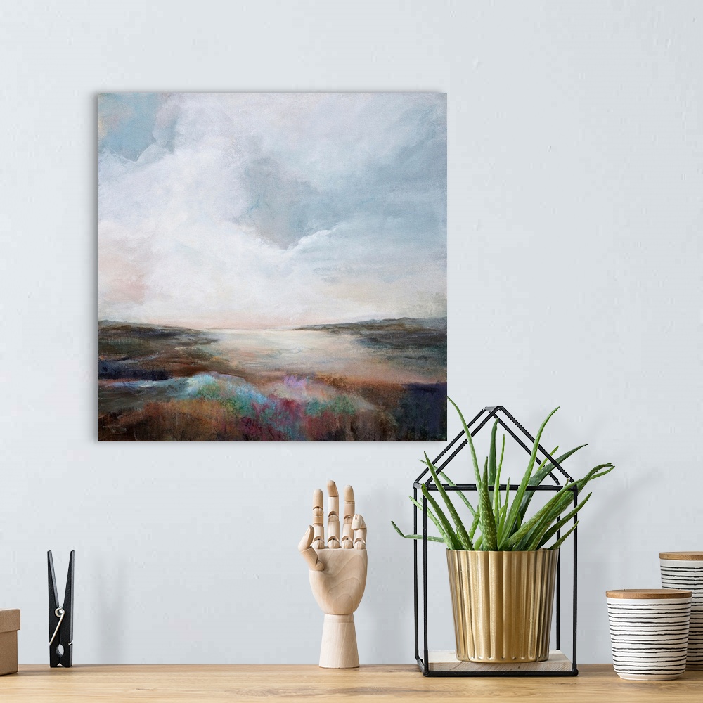 A bohemian room featuring Abstract landscape painting in muted hues.