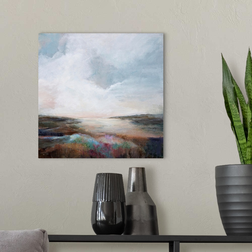 A modern room featuring Abstract landscape painting in muted hues.