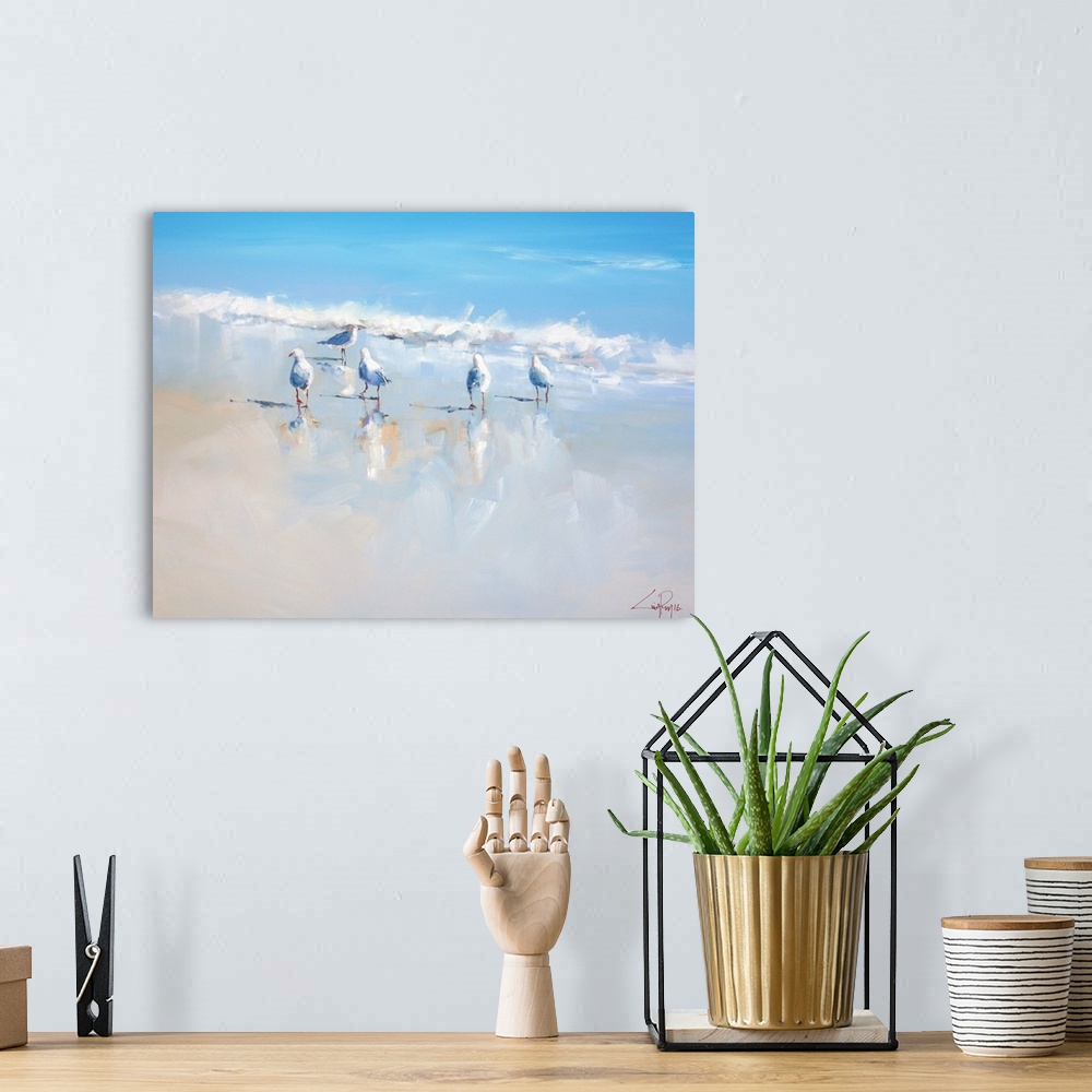 A bohemian room featuring A contemporary painting of seagulls walking along the beach waves.