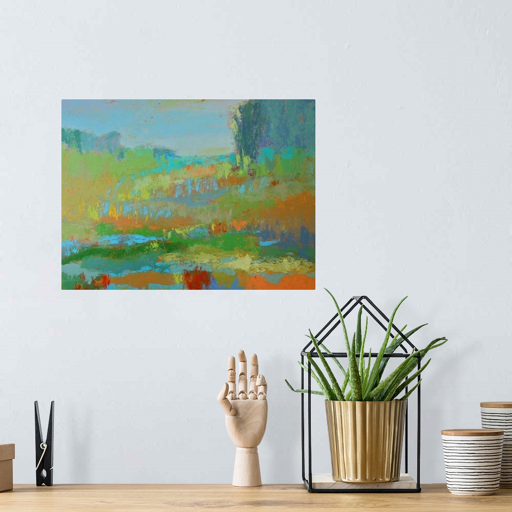 A bohemian room featuring A contemporary abstract painting using vibrant colors resembling a countryside landscape.