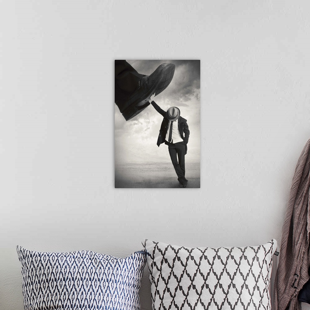 A bohemian room featuring An abstract art photograph of a man wearing a hat and suit, leaning against a giant foot trying t...