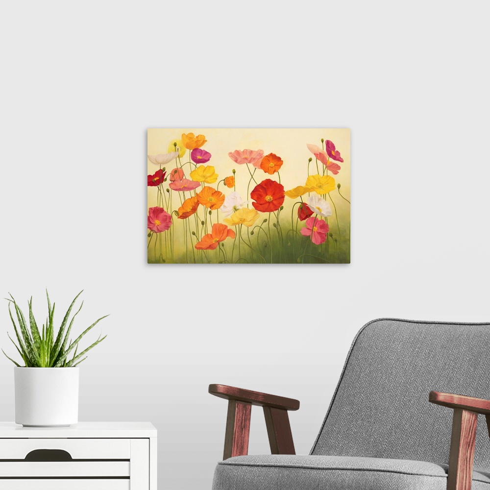 A modern room featuring A contemporary painting of a group multi-colored poppy flowers in green grass.