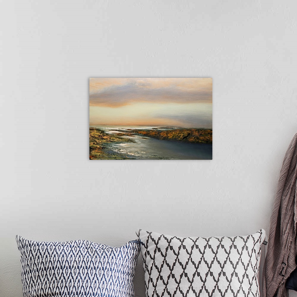 A bohemian room featuring Contemporary seascape painting in front of a pastel sunset.