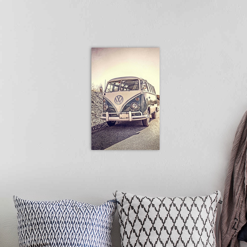 A bohemian room featuring A classic old surfers vintage Volkswagen 21 window Samba Bus at the beach.