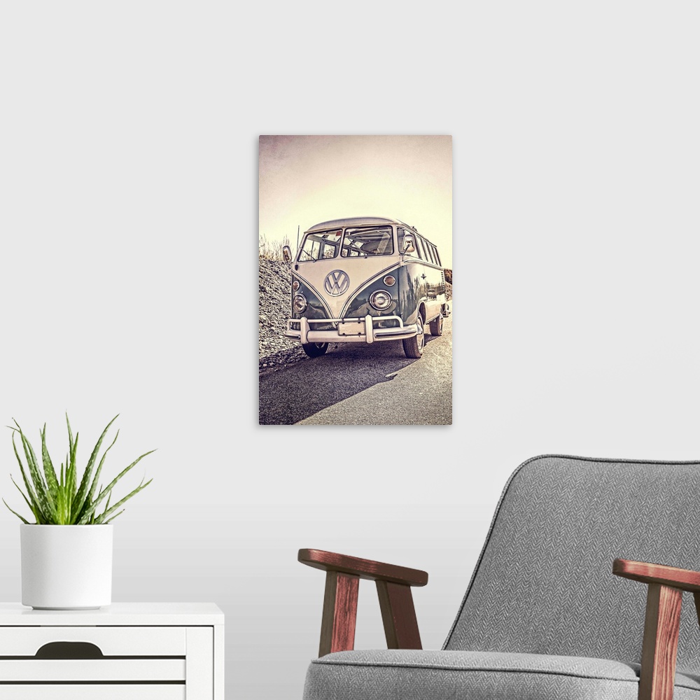 A modern room featuring A classic old surfers vintage Volkswagen 21 window Samba Bus at the beach.