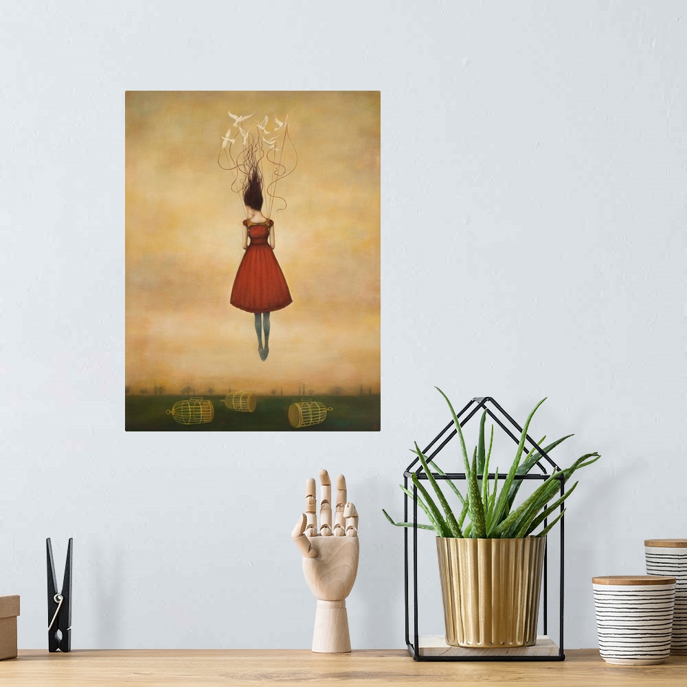A bohemian room featuring Contemporary surreal artwork of a woman floating in the air in a red dress with birdcages below.