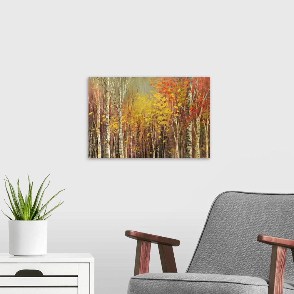 A modern room featuring Painting of a grove of trees in bright fall colors.