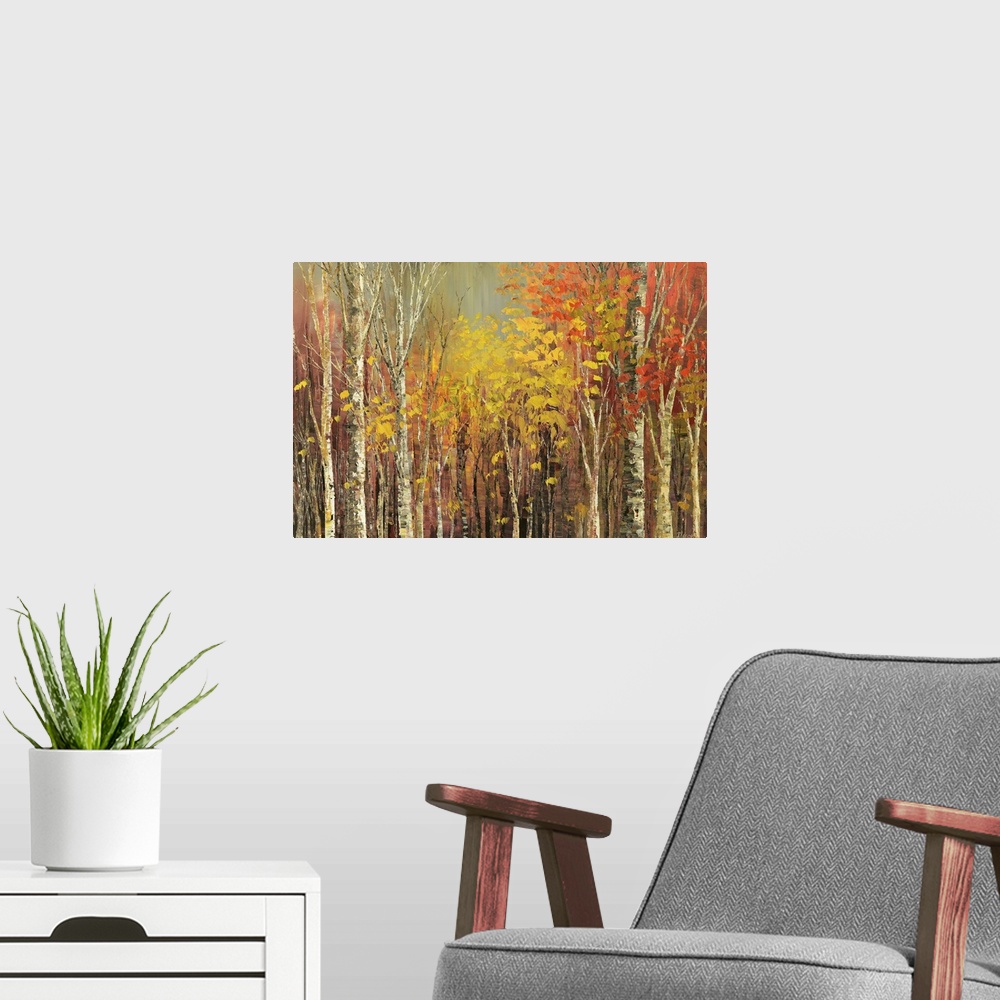 A modern room featuring Painting of a grove of trees in bright fall colors.