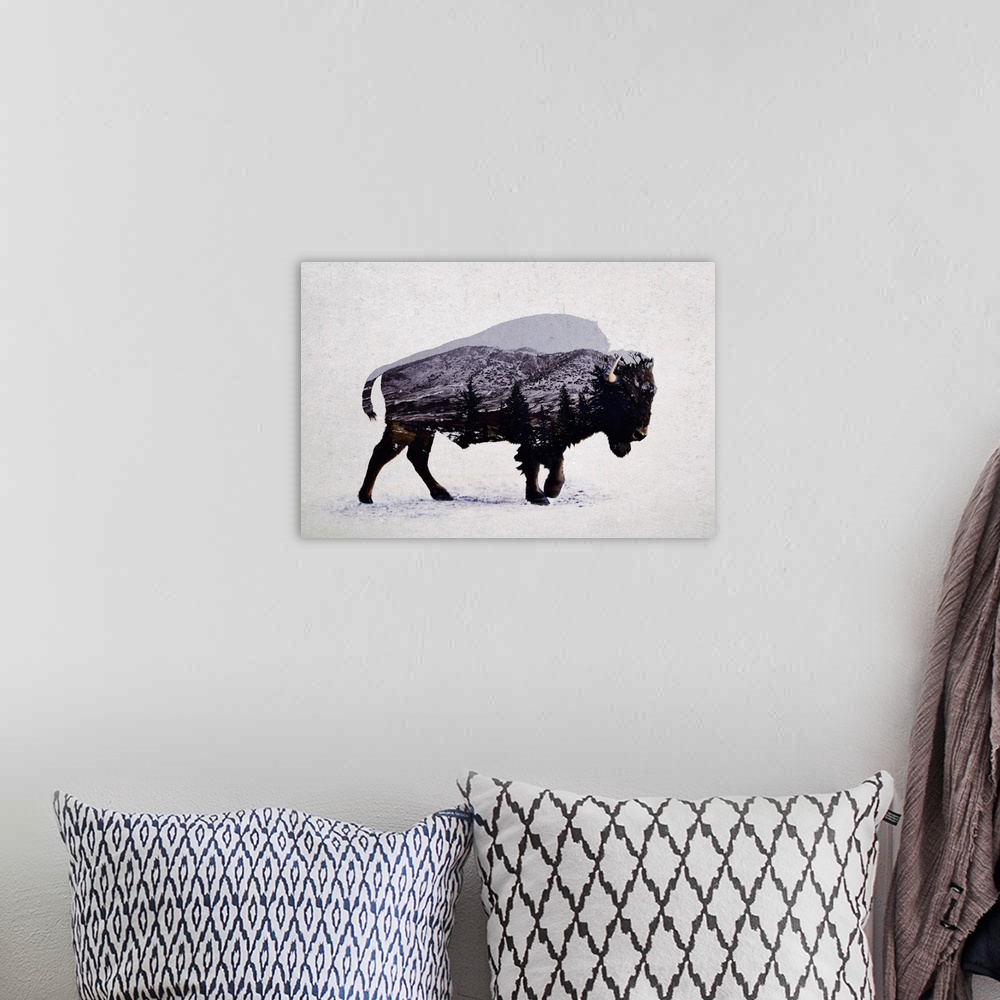 A bohemian room featuring A contemporary piece of artwork of a wilderness scene withing the outline of an American bison.