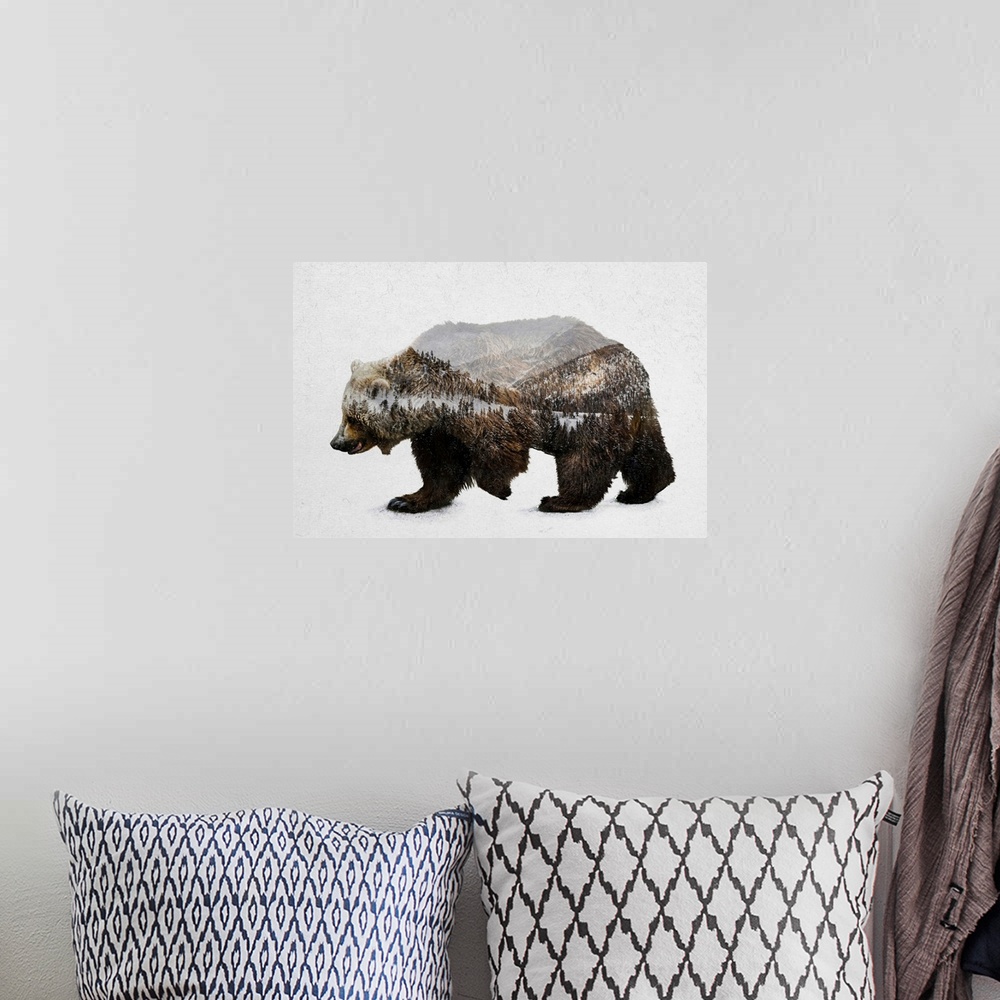 A bohemian room featuring A contemporary piece of artwork of a wilderness scene withing the outline of a brown bear.